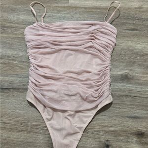 Aritzia pink ruched bodysuit